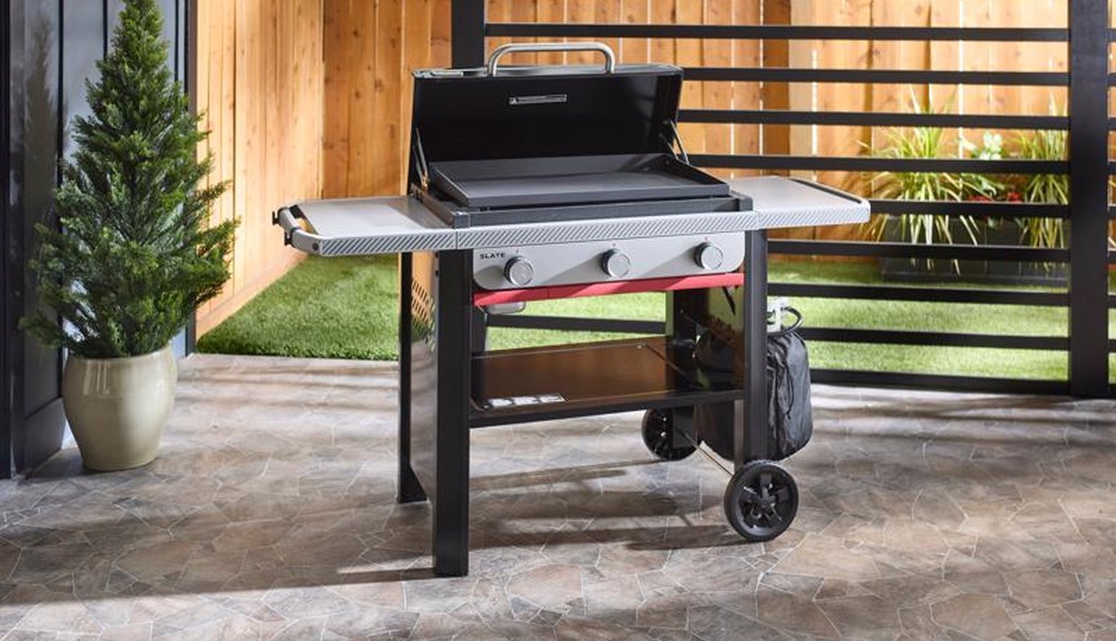 Weber Slate 28 inch 3-burner griddle on a patio